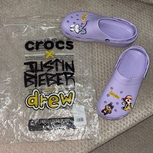 Crocs, women’s size 11 mens size 9, drew crocs lavender